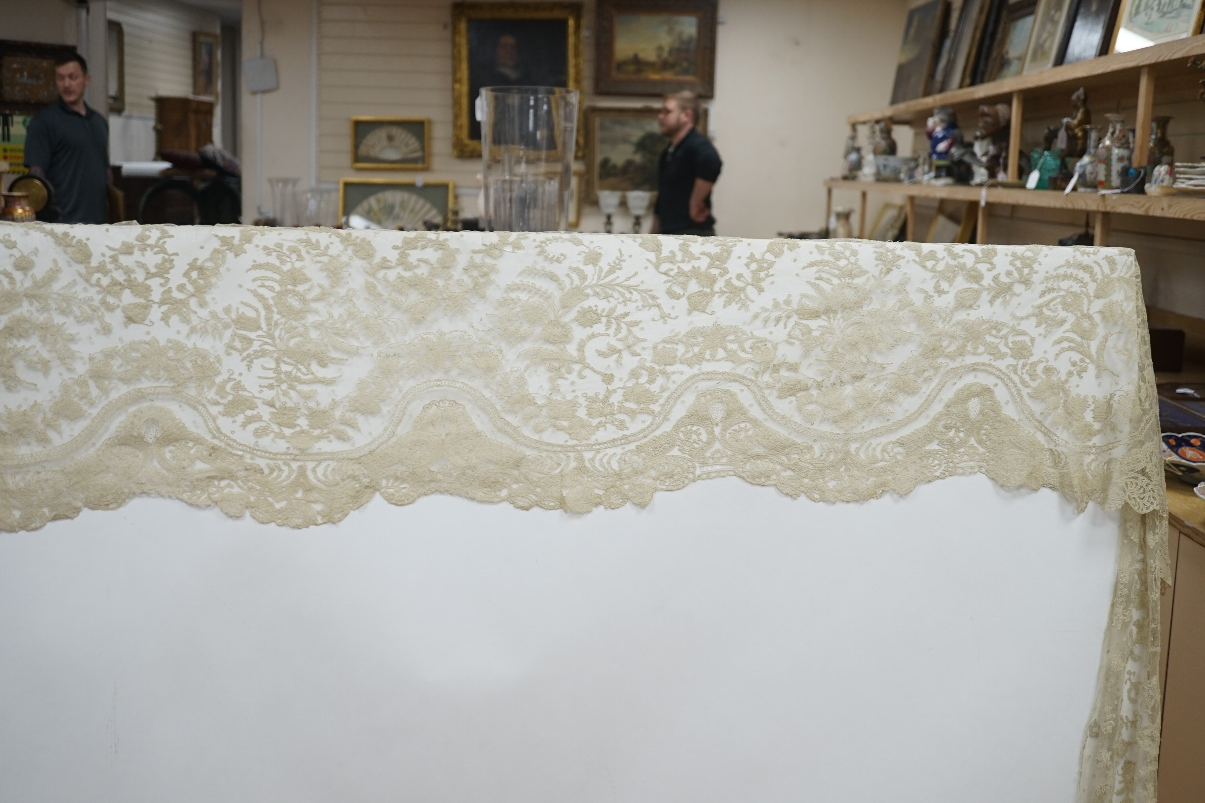 A rare length (9 and a half yards) of Brussels 19th century needle lace, some repairs and damage, circa 1880 and a similar wedding veil